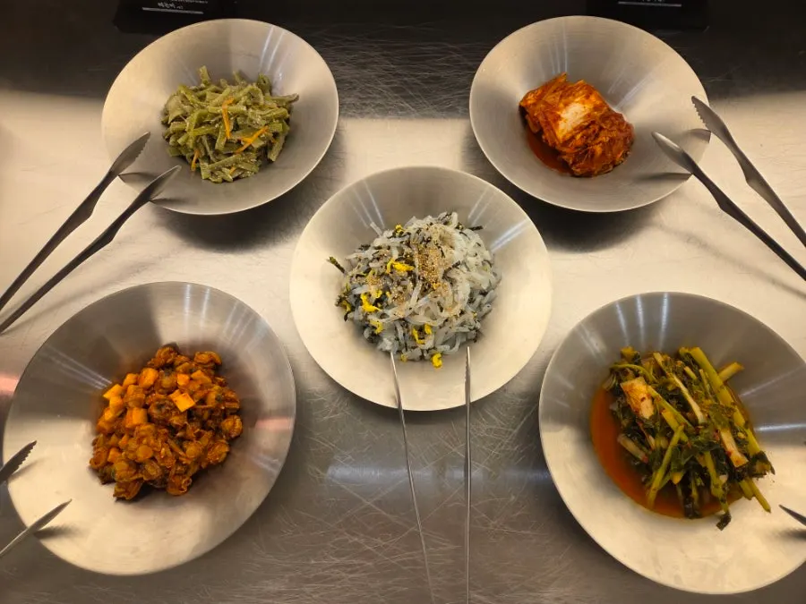Eggplant tangsuyuk and namul side dishes on the self-serve bar