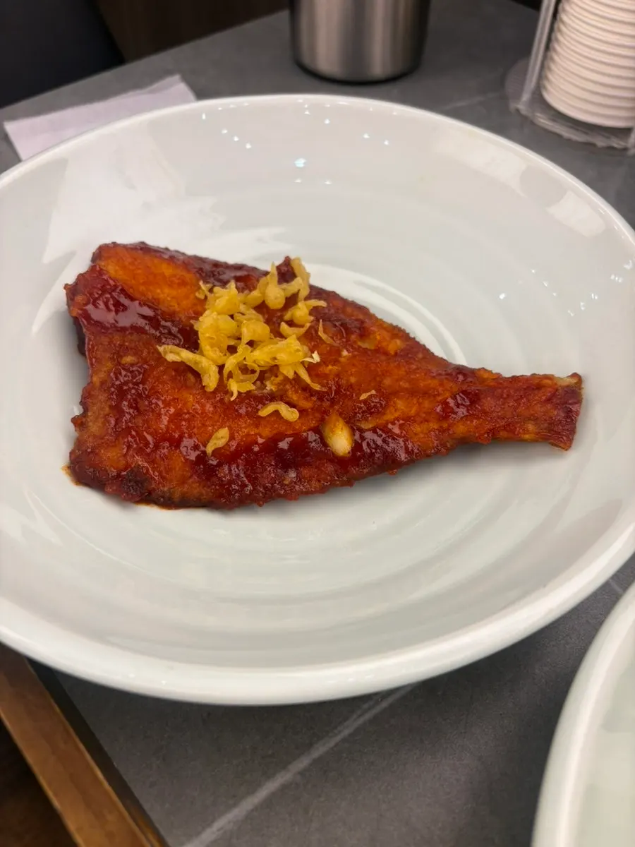 Seasoned grilled flounder served as a default dish