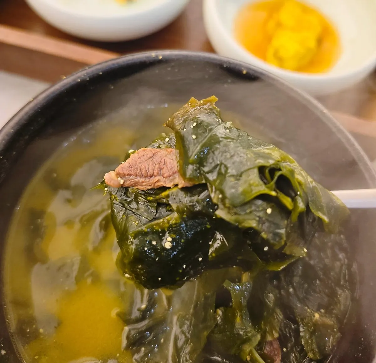 Full table with rich beef seaweed soup