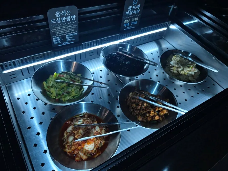 Seasoned scallops and sweet and sour mushrooms at the self-bar