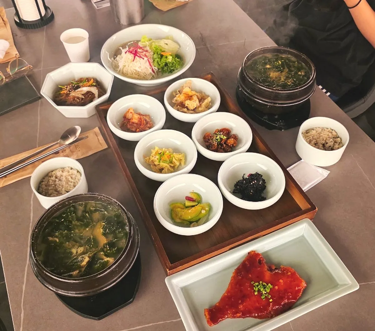 Full table setting of the flounder seaweed soup set meal