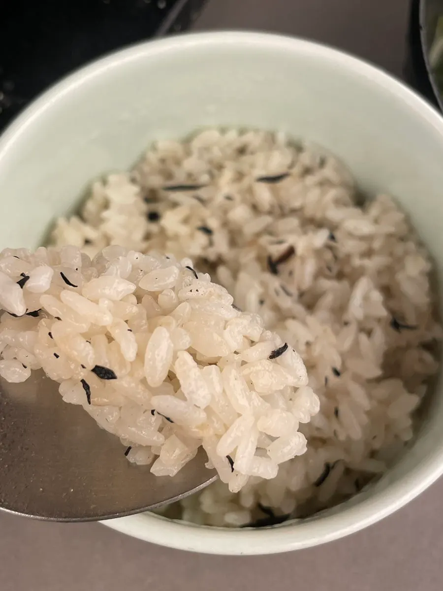 Rice served alongside the seaweed soup