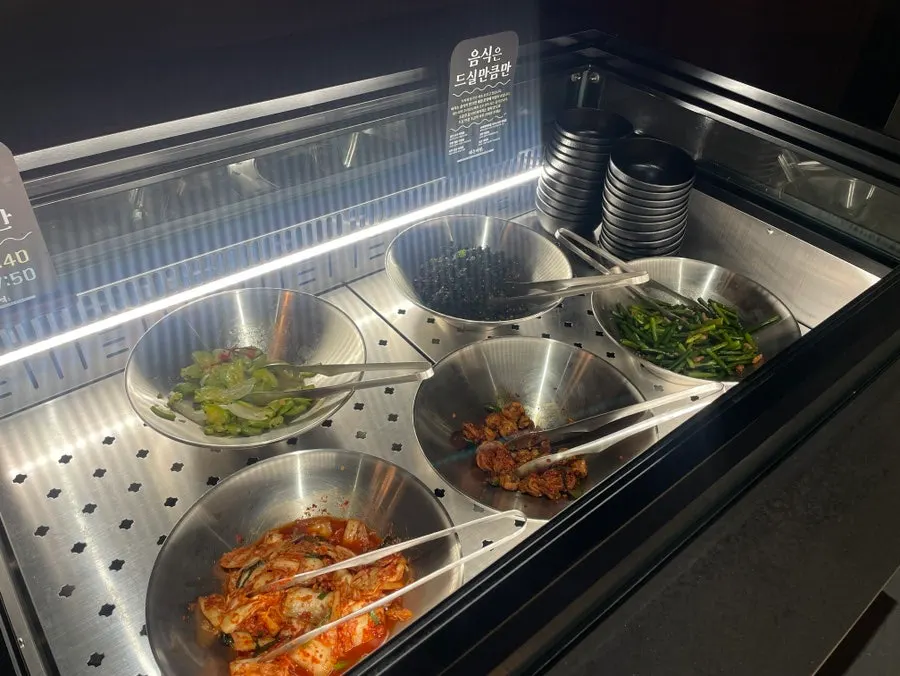 Self-serve bar corner where guests help themselves freely