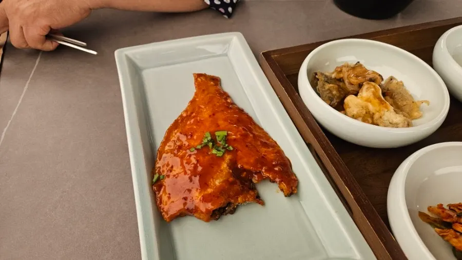 Braised seasoned flounder served as part of the set meal