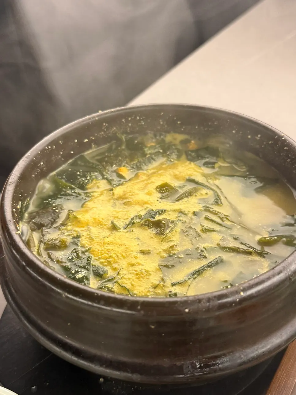A spoonful of sea urchin seaweed soup