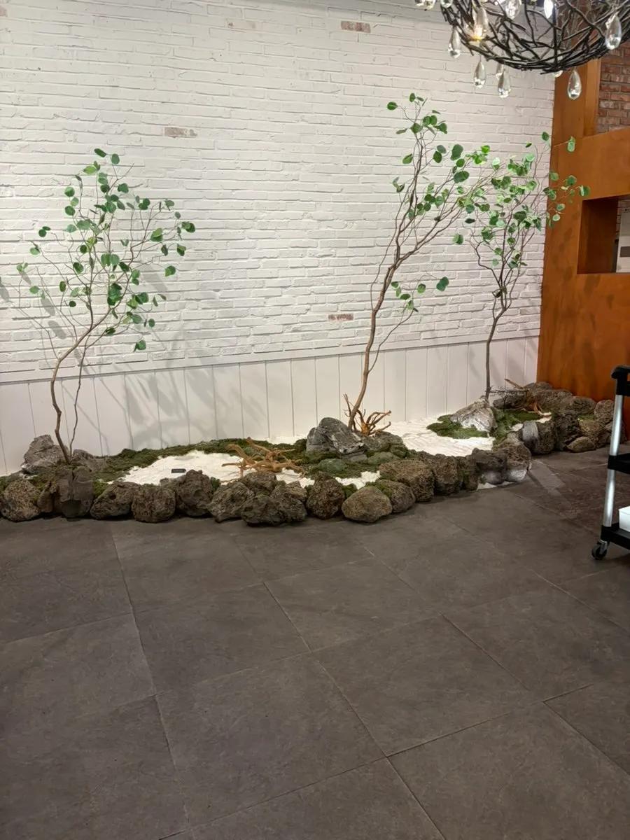 Japanese-style landscaping around the entrance