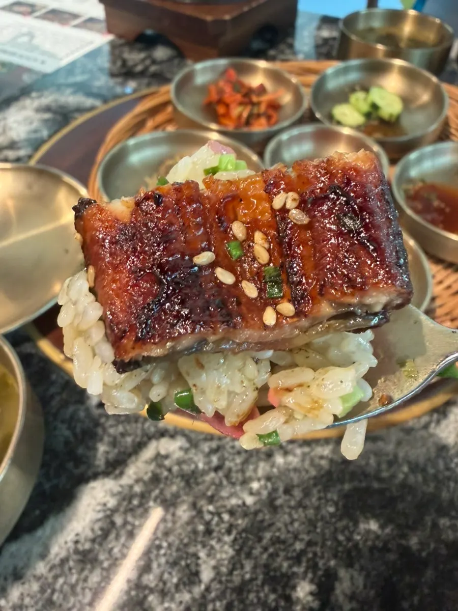 A piece of eel placed over rice