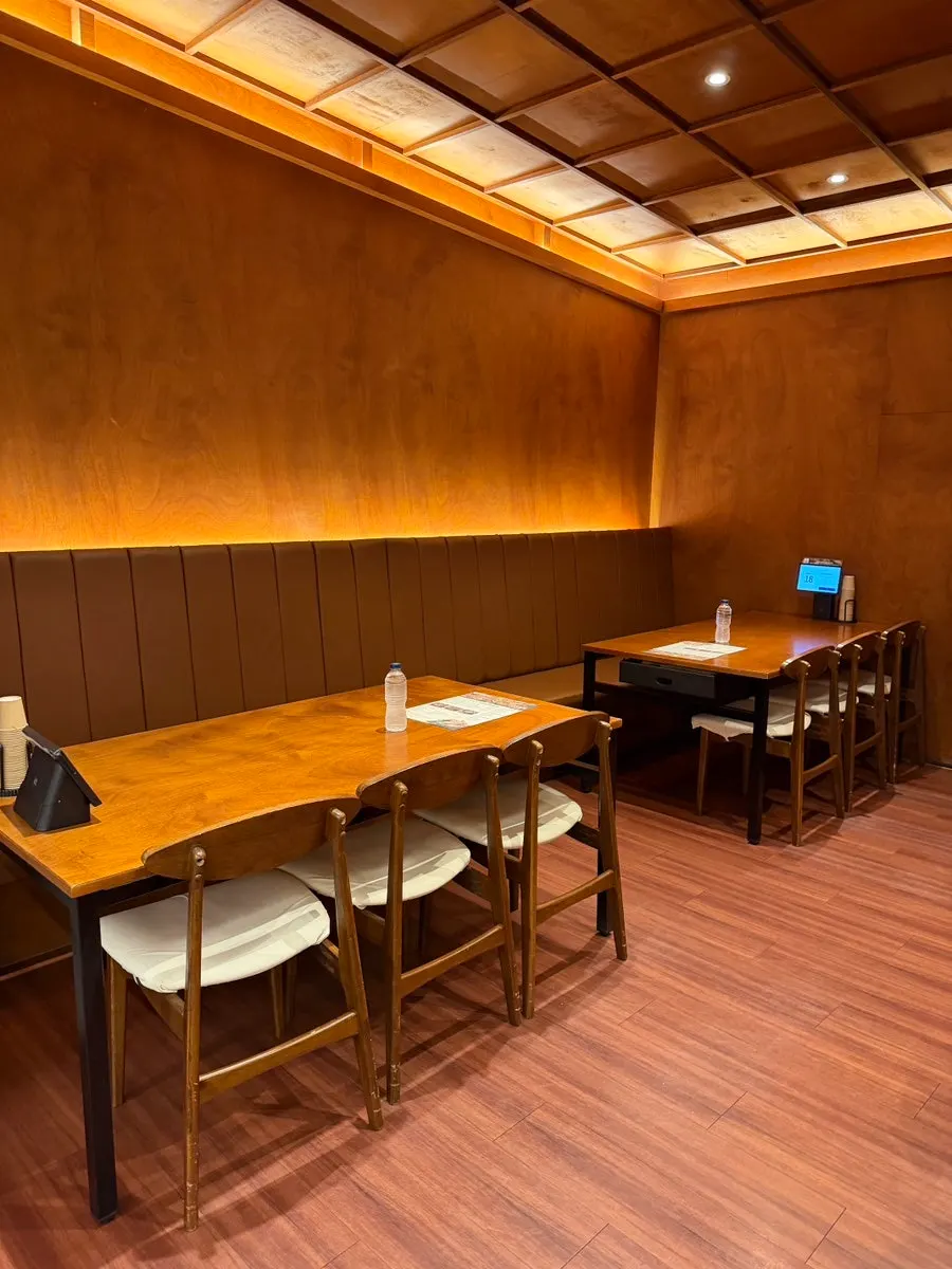Wood-toned interior of Haenyeo Sotbap Gyeongsan