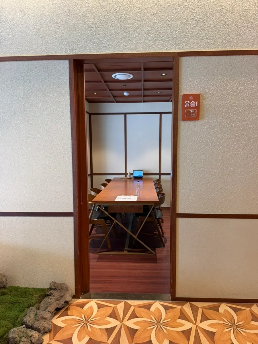Interior hallway leading to the private rooms at Haenyeo Sotbap
