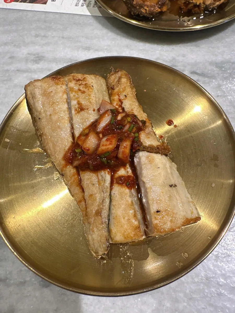 Close-up of Haenyeo Sotbap's banchan plates
