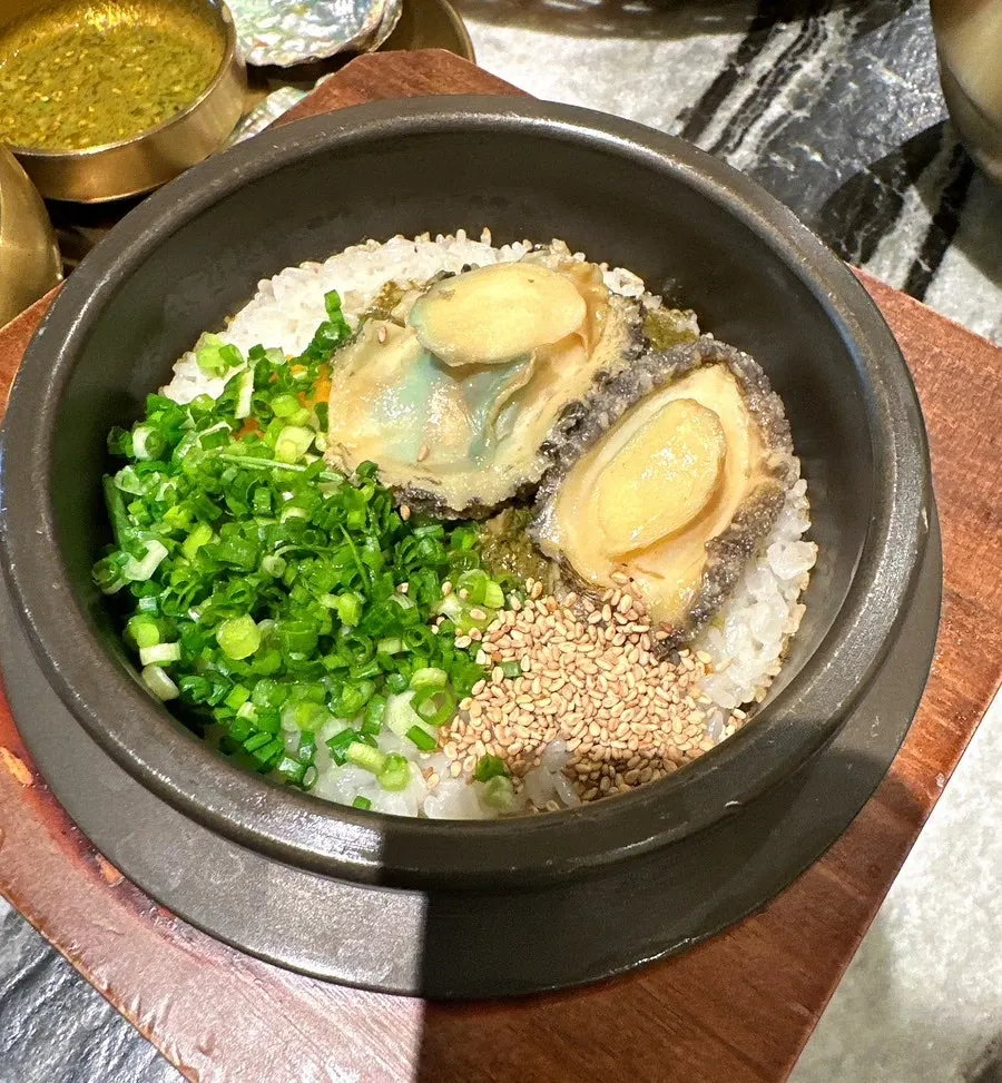 Rice scooped out of the sotbap to prepare sungnyung