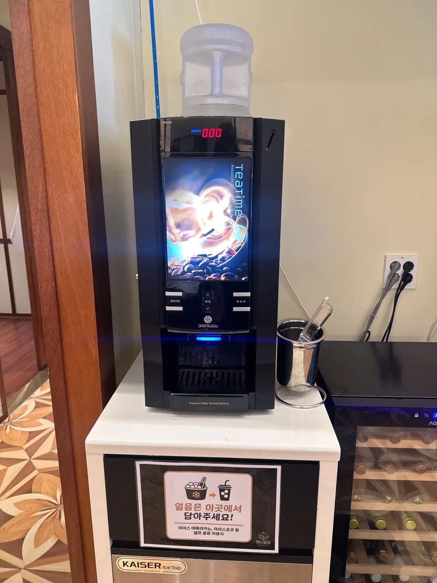 Self-serve corner with dessert candies and drinks