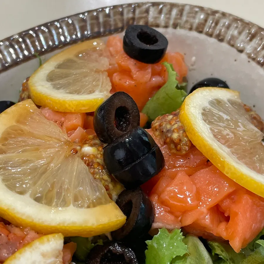 A salmon salad with tofu and vegetables