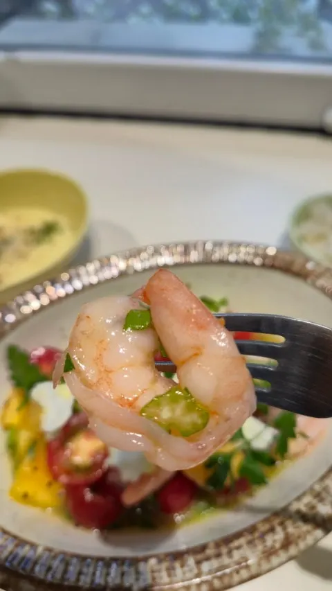 Close-up of plump shrimp in the seafood salad