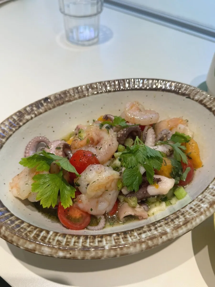 A plate of HEOD Mapo seafood salad