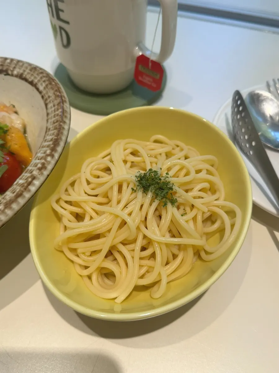 Noodles added to the seafood salad