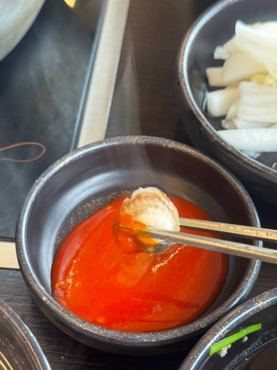 Haesintang broth served in a bowl