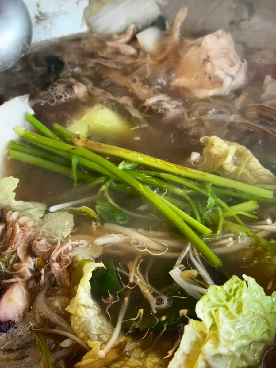 Fish cake and minari added to the haesintang