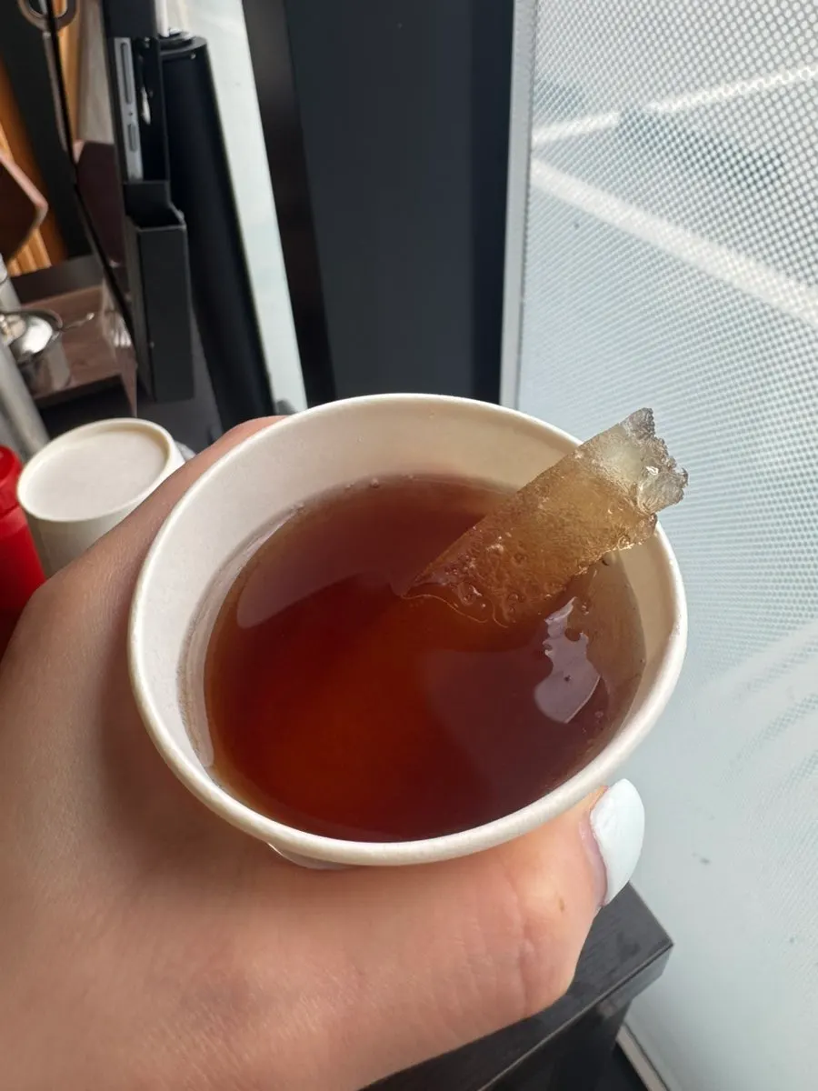 Ice-cold plum tea served for dessert