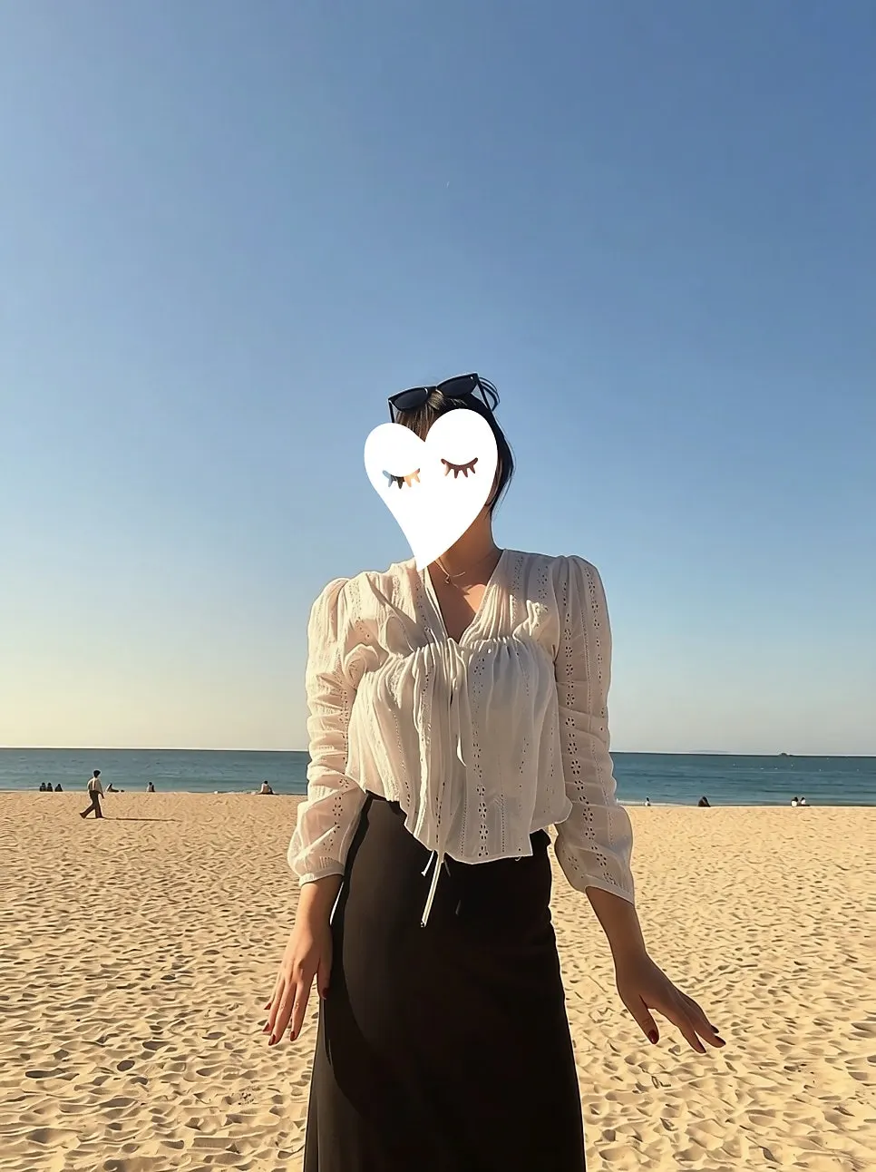 Photo taken at Haeundae Beach holding an iced americano