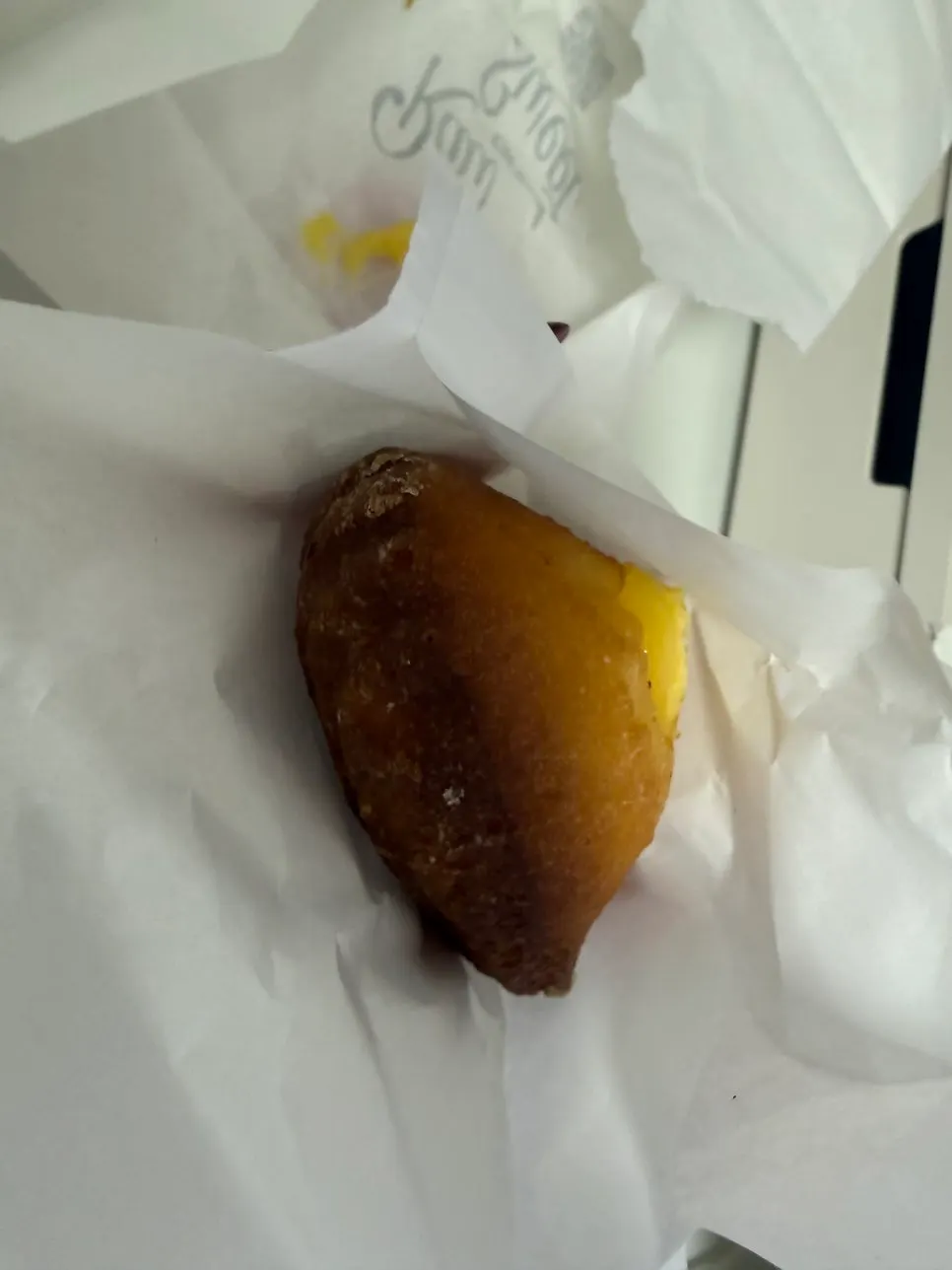 Custard filling of an egg tart cut in half