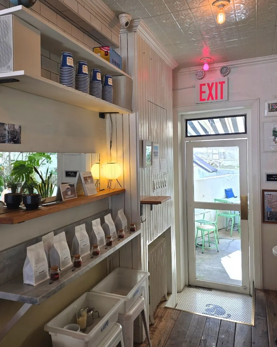 Café tables spaced comfortably apart