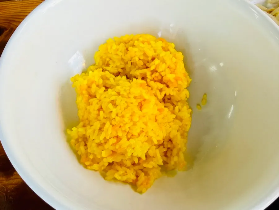 Yellow turmeric rice served with the set menu