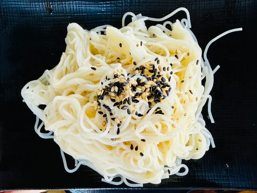 A side of somyeon noodles served with the octopus stir-fry