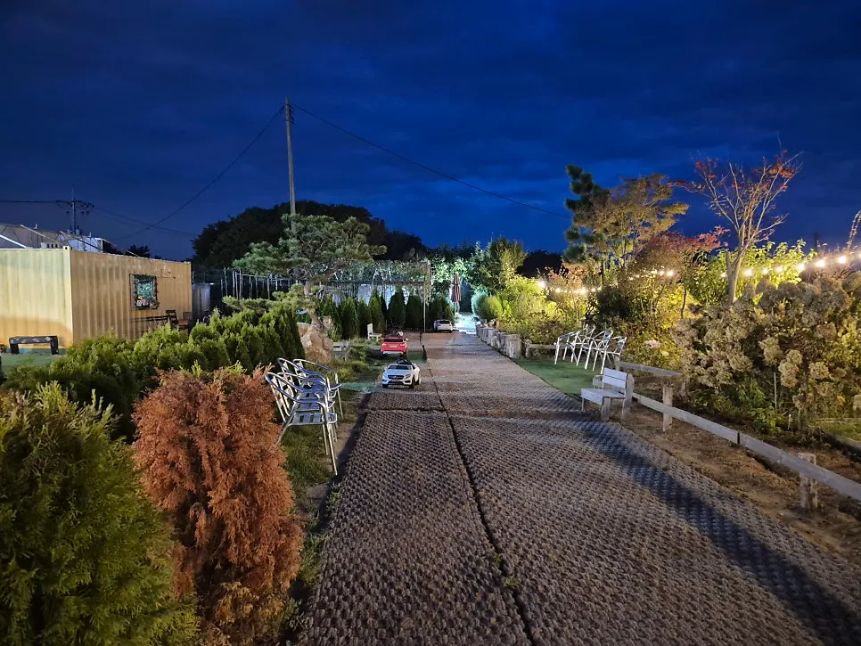 Haesanggung's illuminated garden and the walking path behind it