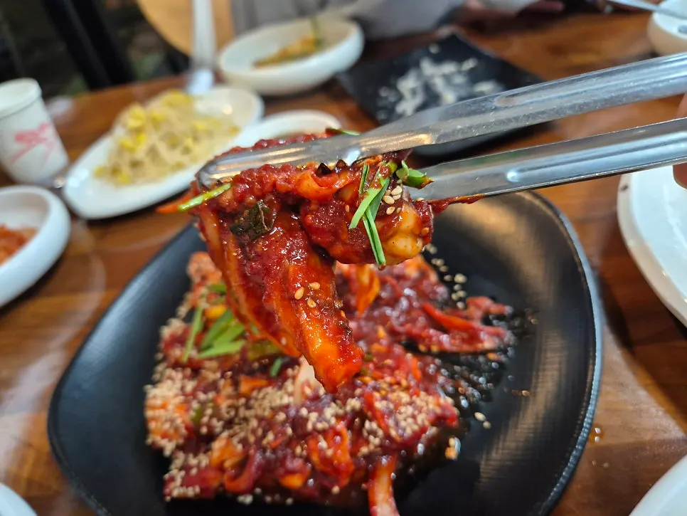Close-up of octopus stir-fry coated in chili sauce