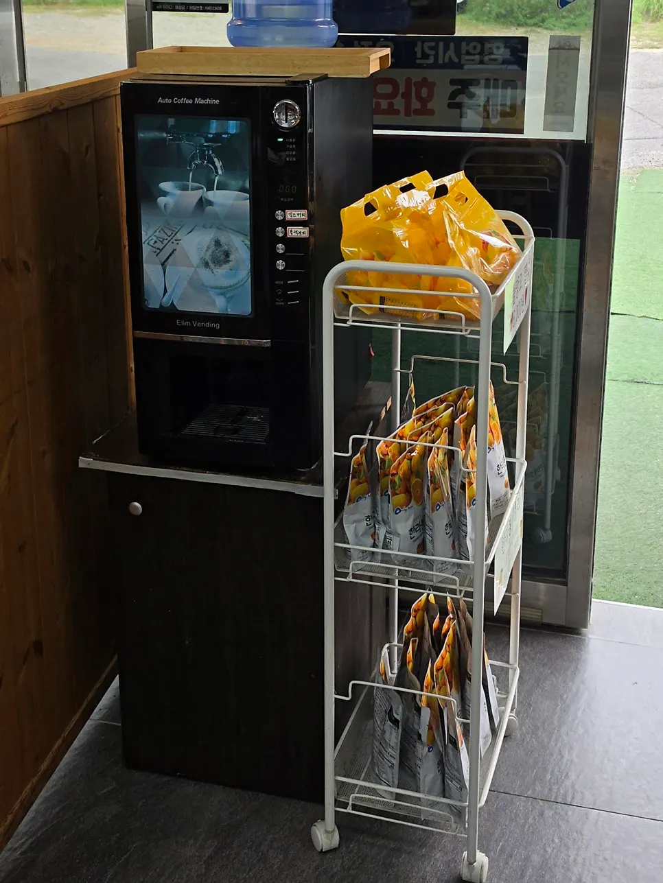 Corner of the restaurant with a dessert coffee machine