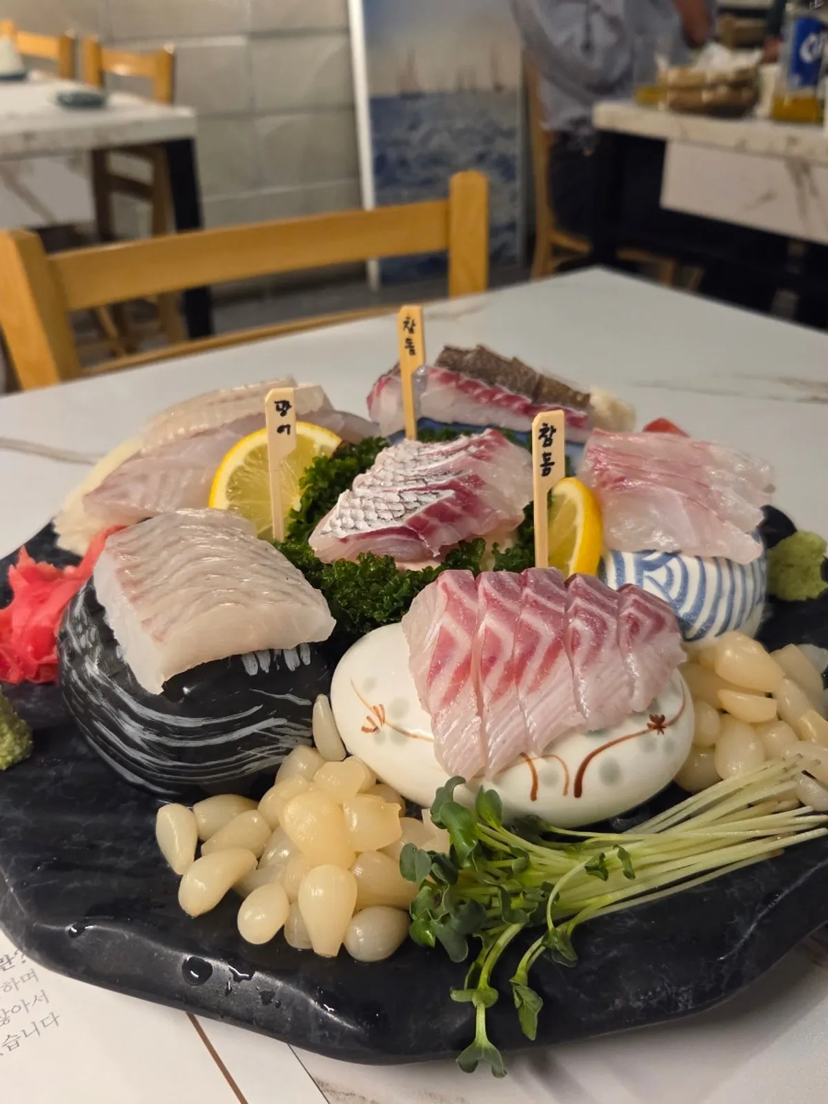 Thick-sliced halibut and red seabream aged sashimi