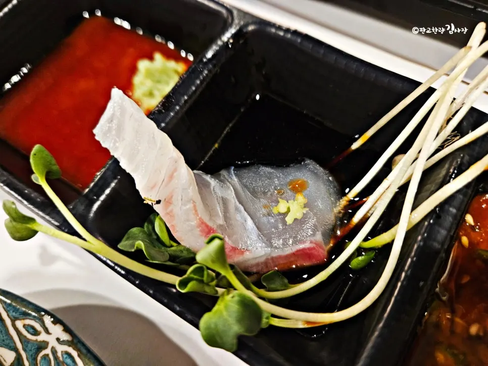 Plate of flounder, sea bream, and rockfish white-fish aged sashimi