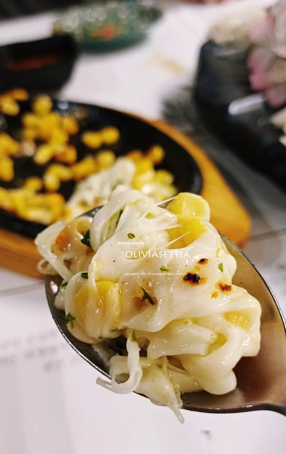 Grilled corn cheese served as a side dish