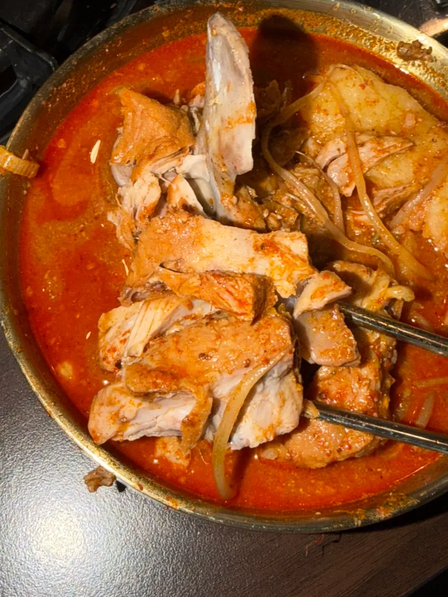 Pork spine meat pulled out of the gamjatang