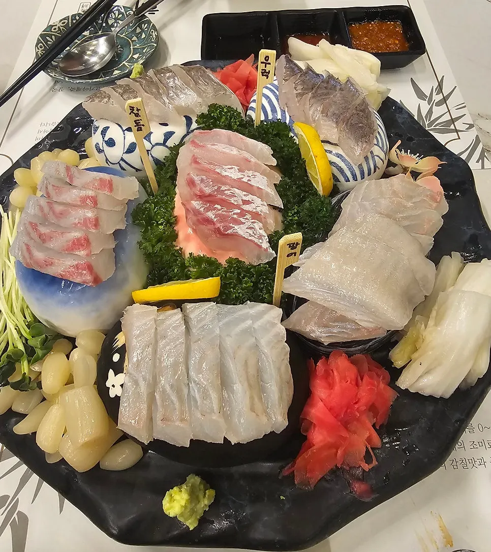 Picking up a piece of aged sashimi