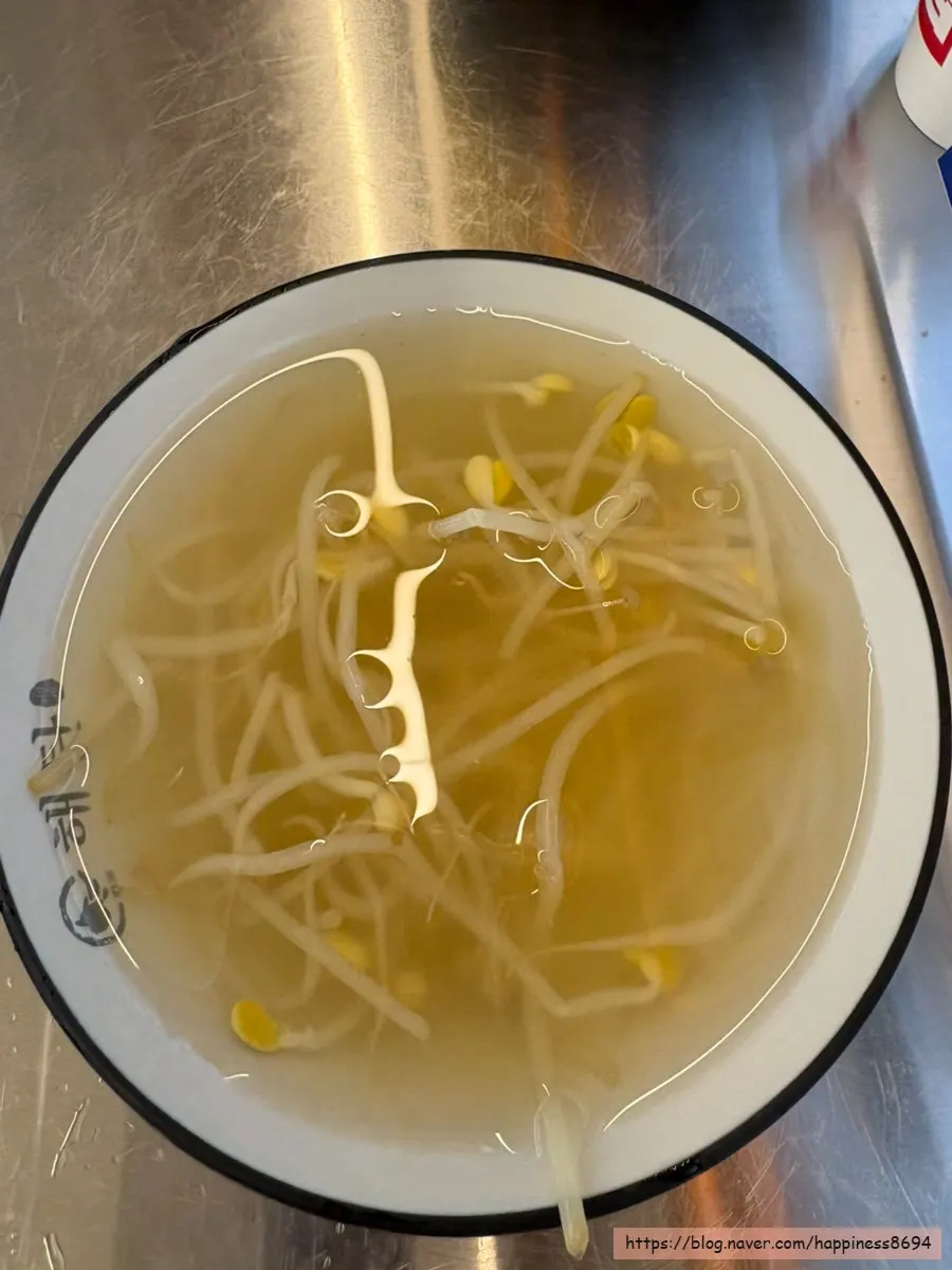 Bean sprout soup and roasted rice tea prepared at the self-serve bar