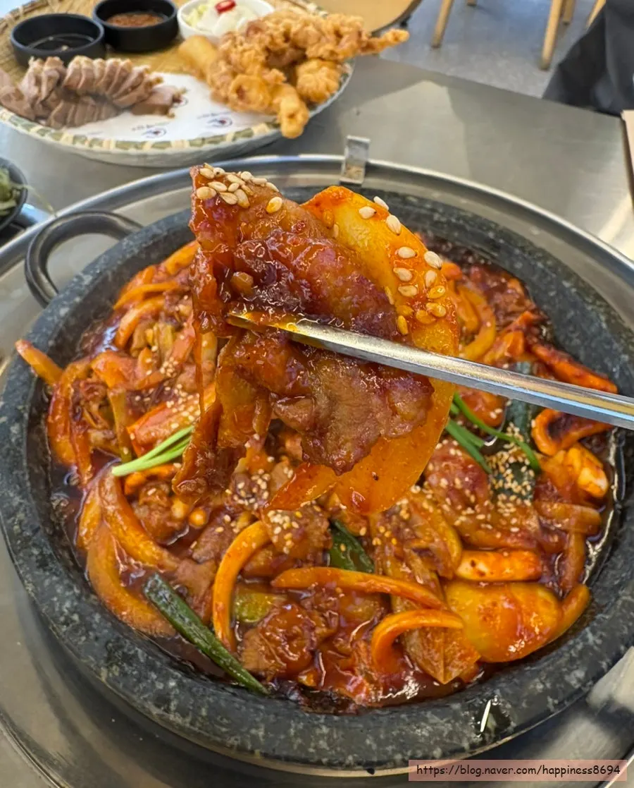 Squid pork cooking on the hot stone plate