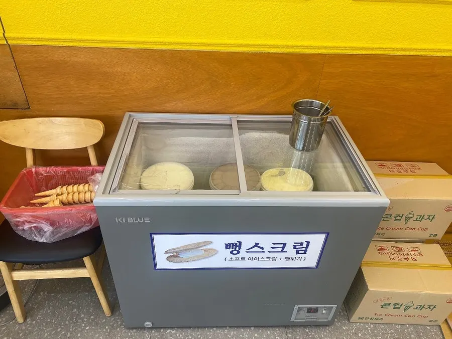 Self-serve bar with rice and side dishes
