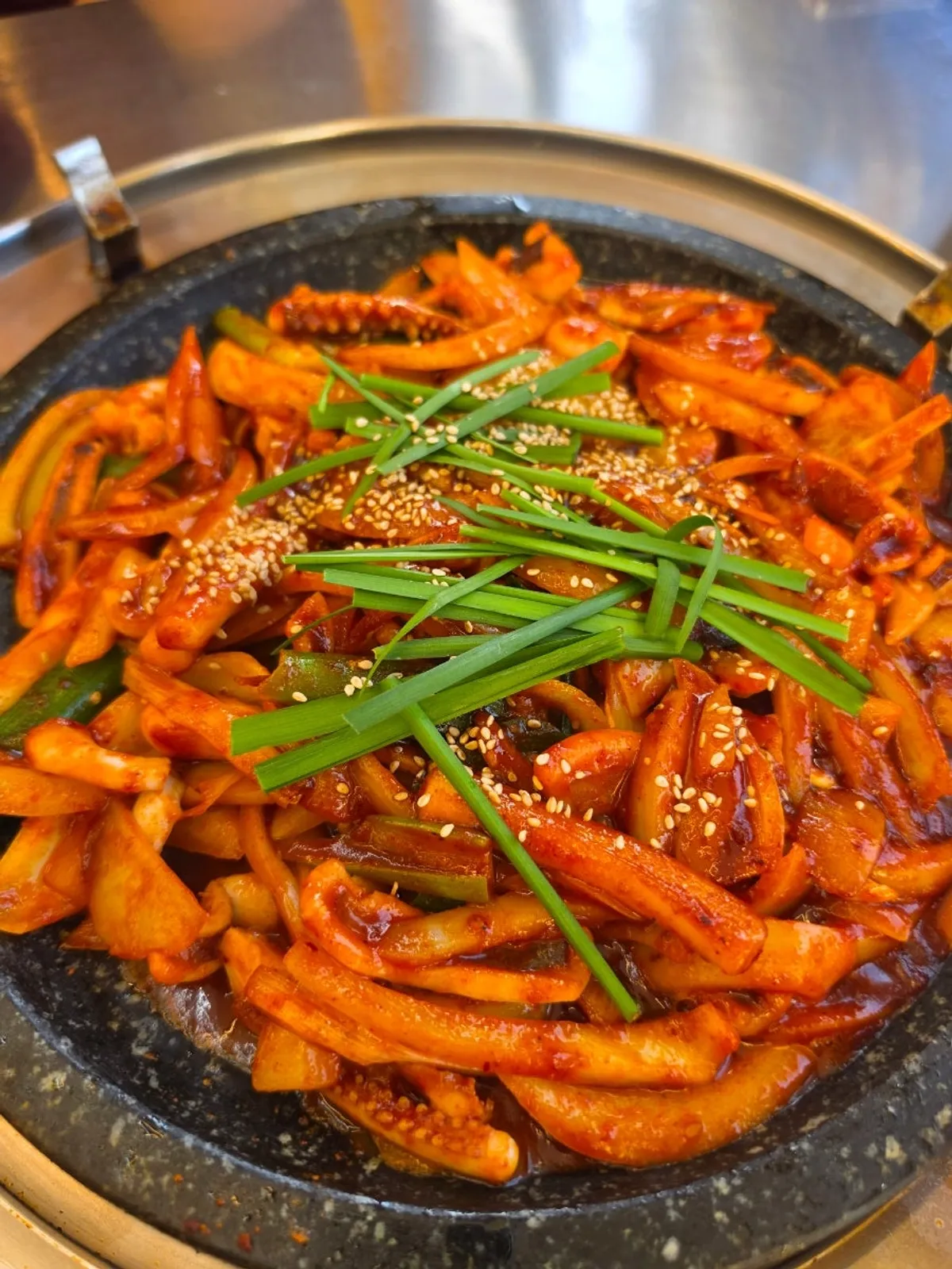 Signature hot-plate squid at Haetan Hwaseong Byeongjeom in rich sauce