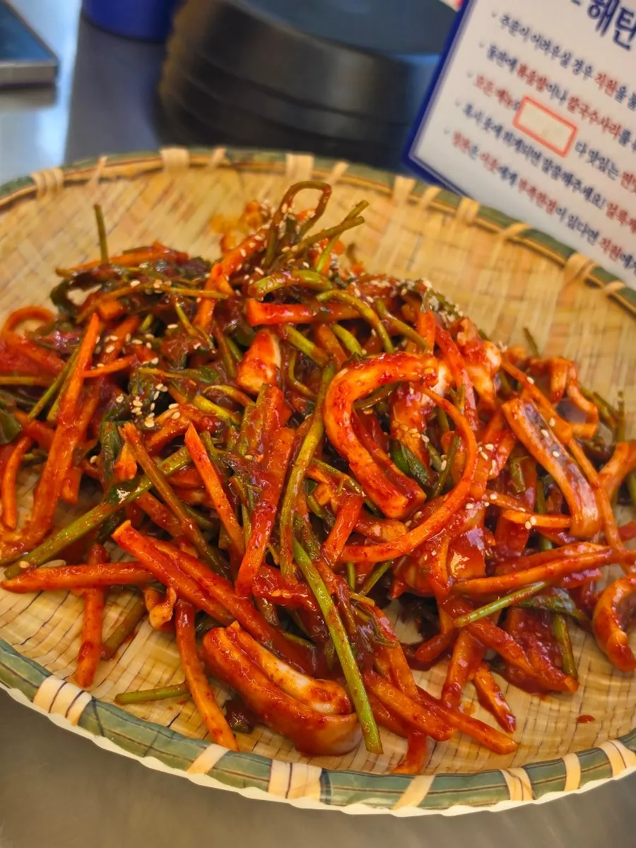 A plate of squid vinegar salad tossed in tangy sauce