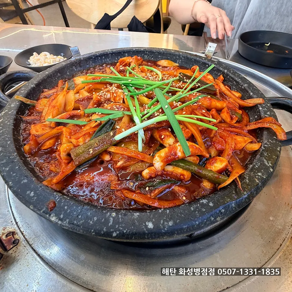 Hot-plate squid for two served on the stone plate