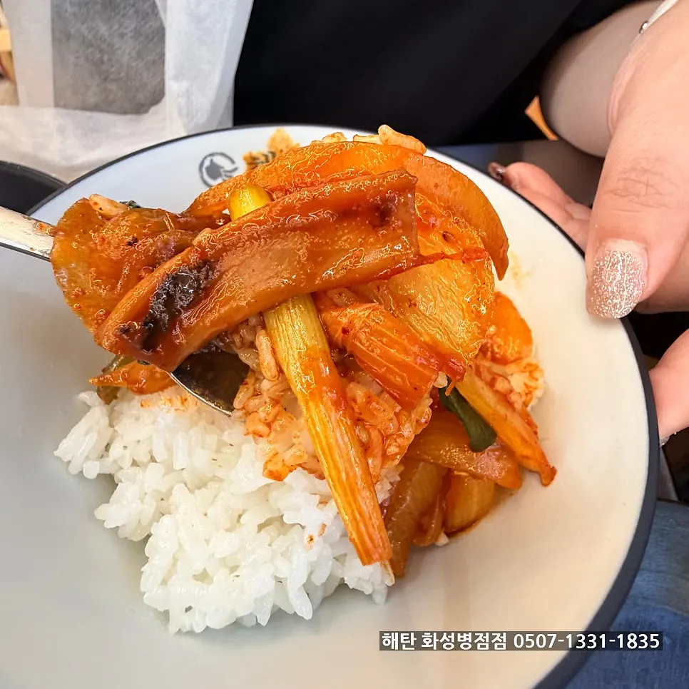 Hot-plate squid and rice cake served over white rice