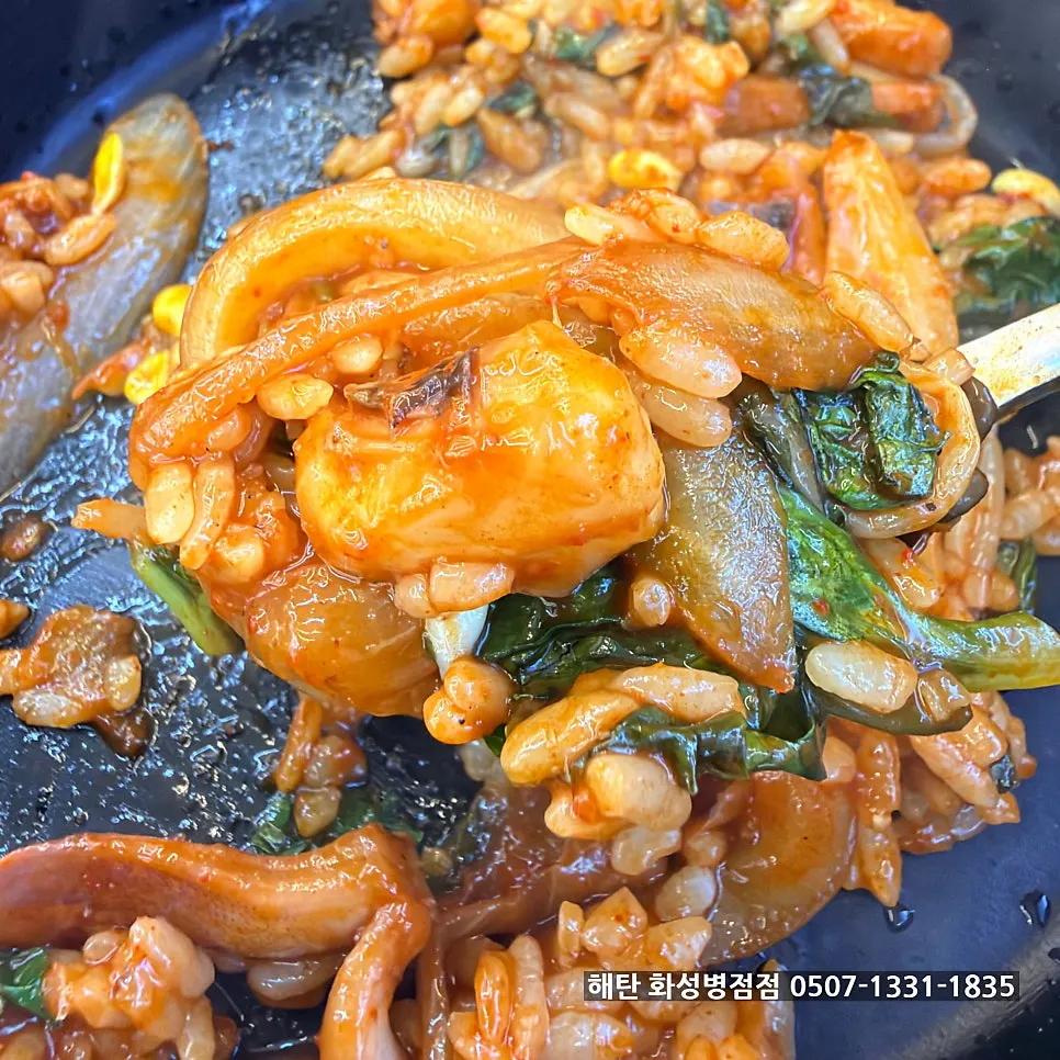 A large spoonful of the fried rice