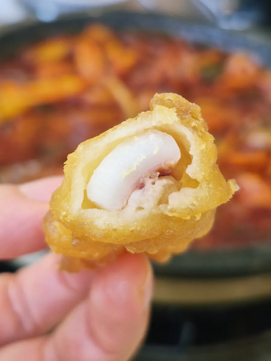 Pork belly served together with squid stir-fry