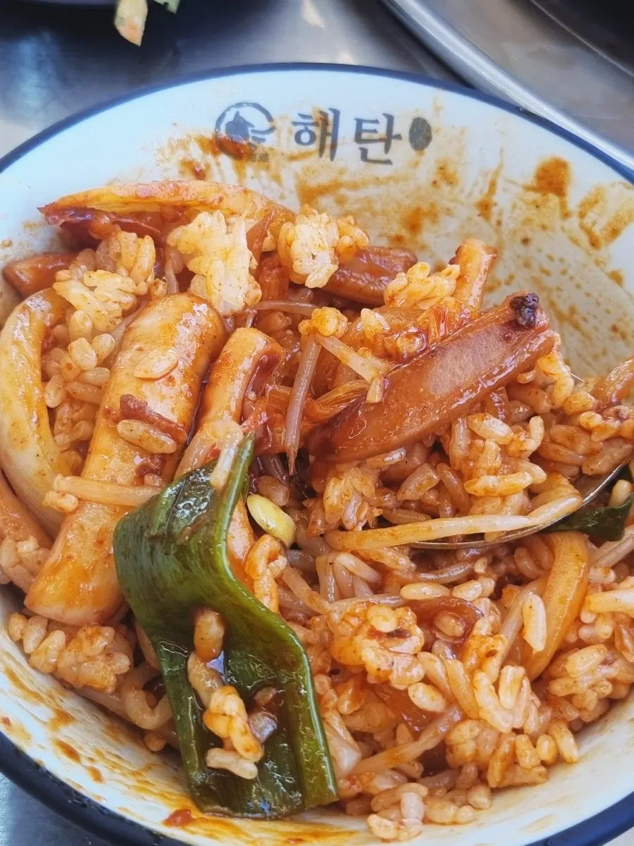 Rice mixed with squid stir-fry and bean sprouts