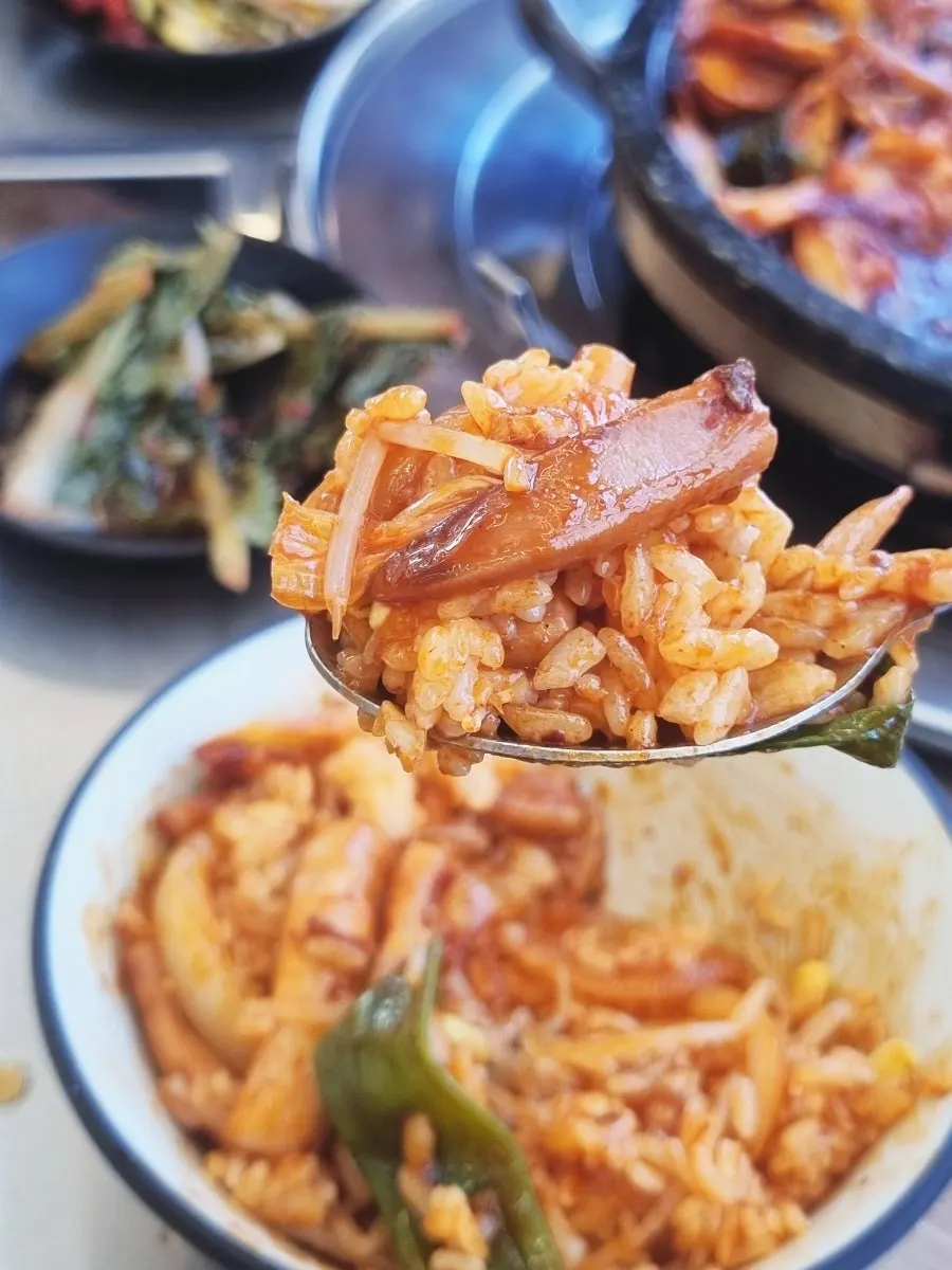 Spoonful of squid stir-fry bean sprout mixed rice