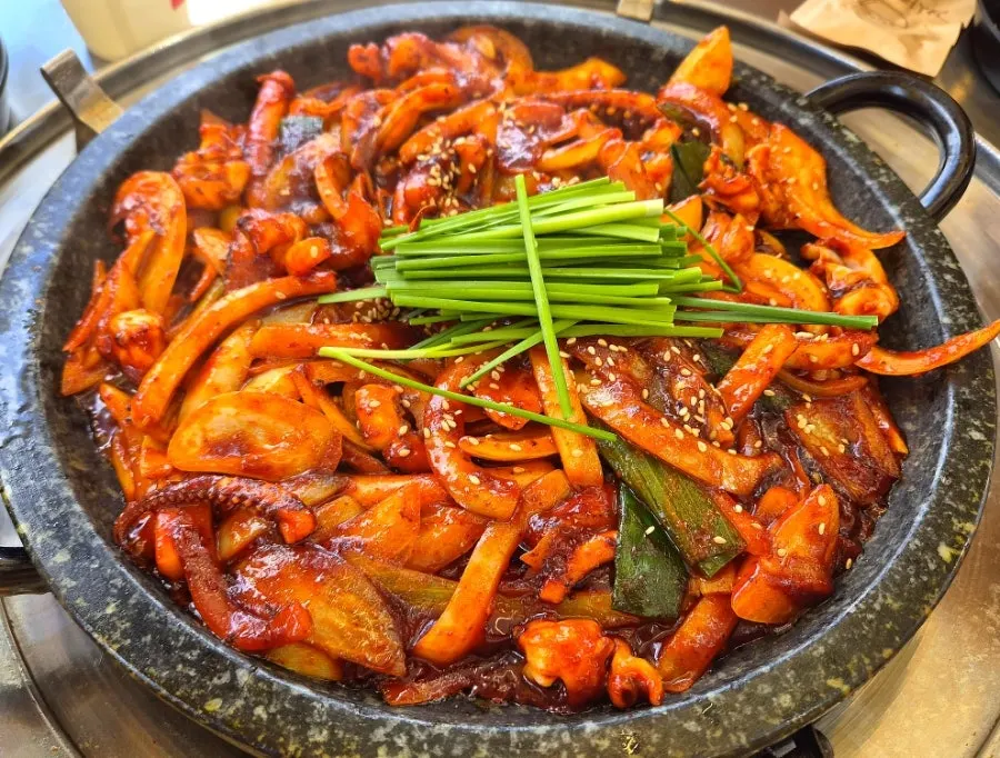 Haetan's stone-plate squid served on a hot stone