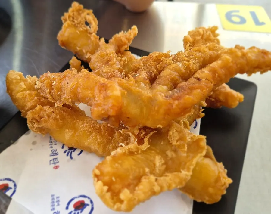Haetan's half plate of fried squid served on the table