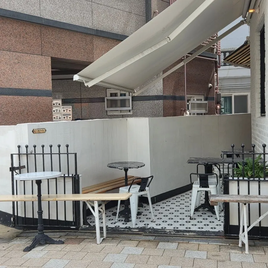 Entrance of Low & Sweet Bakery on the building's first floor